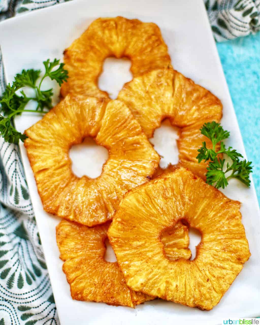 air fryer pineapple slices on a plate