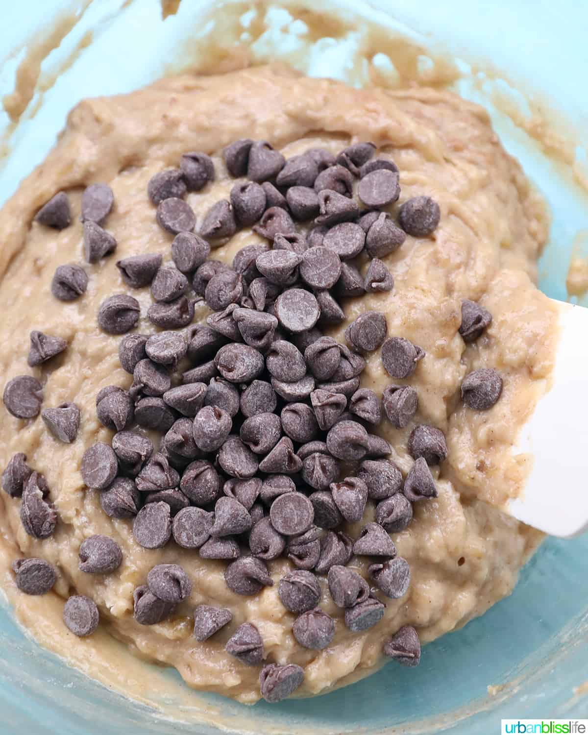 adding chips to banana bread cookies batter