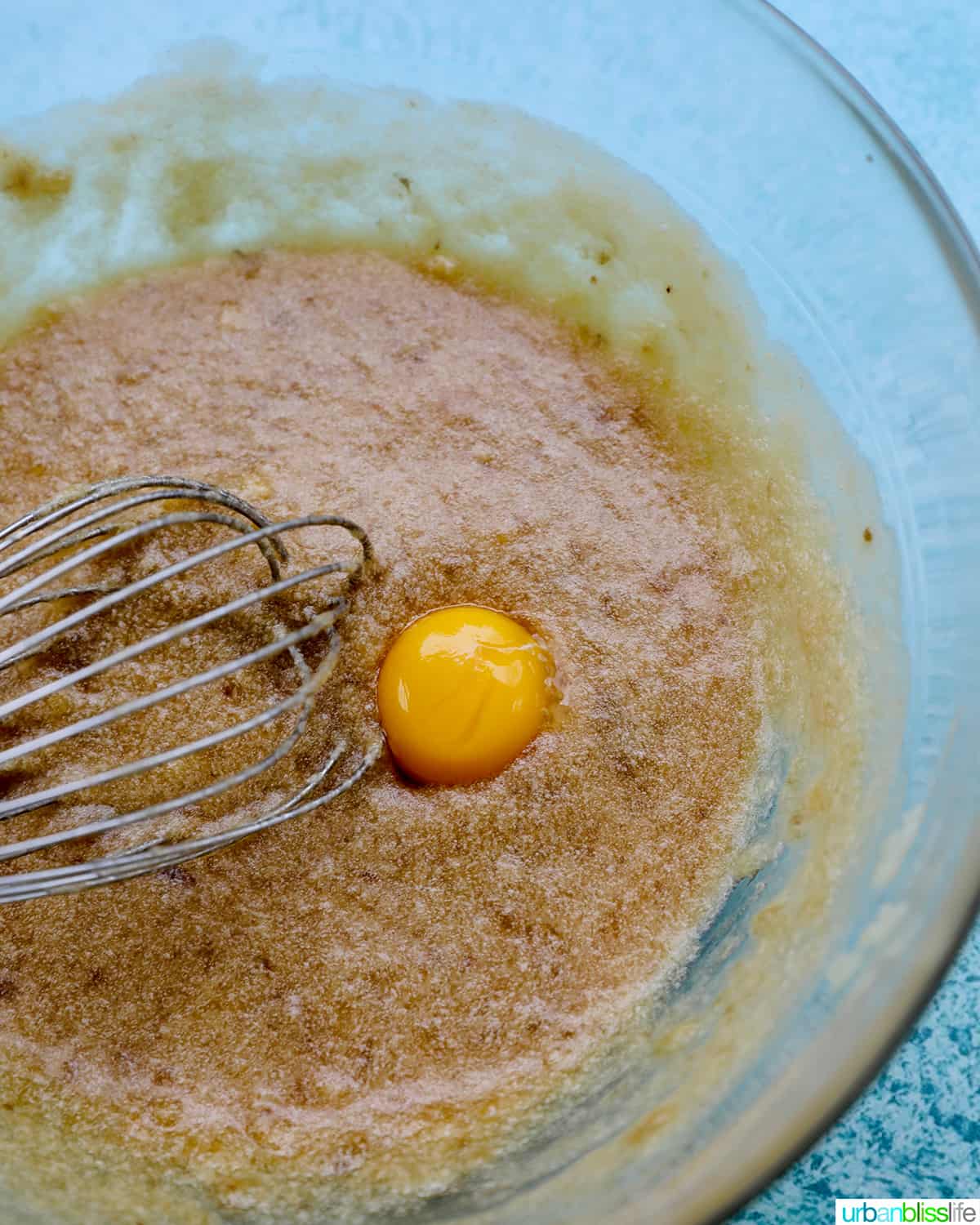 whisking in egg yolk to cookie batter