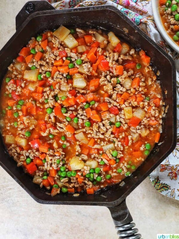 ground pork menudo in a cast iron skillet
