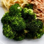 air fryer broccoli on plate with pasta.