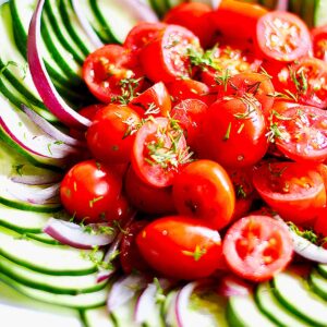 cucumber tomato salad with red onions.