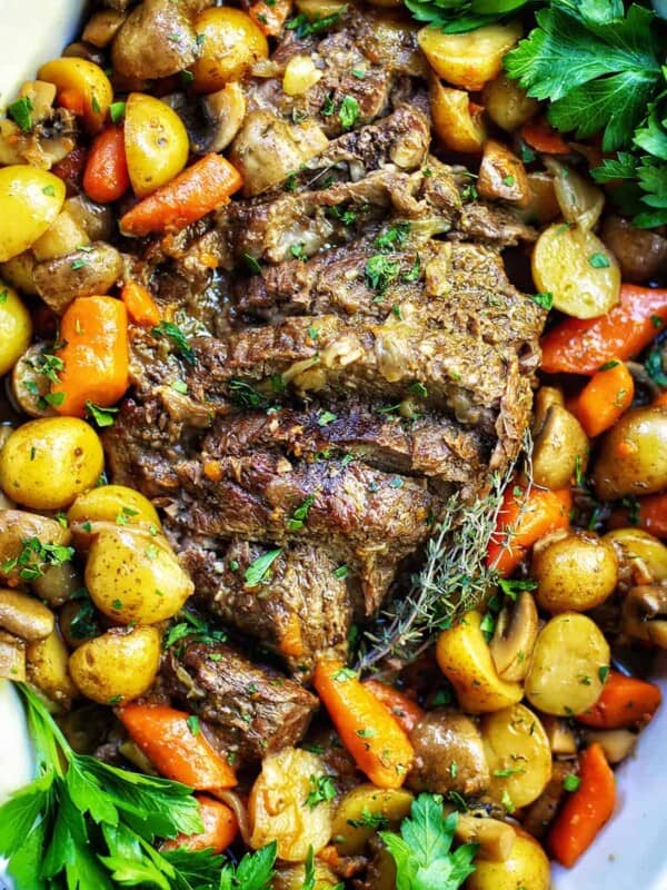 dutch oven pot roast with potatoes and carrots.