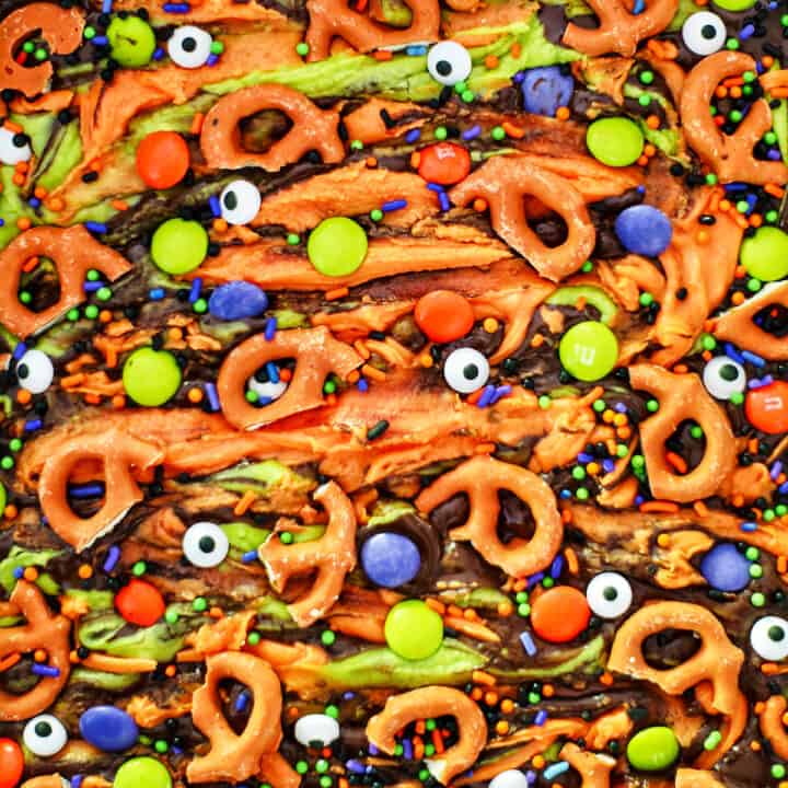 colorful halloween bark with pretzels and melted colored chocolate.