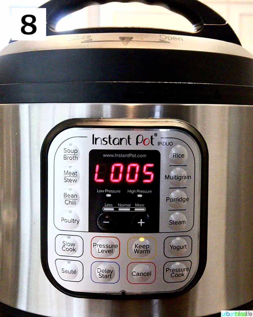 instant pot electric pressure cooker with LO:05 display for natural release.