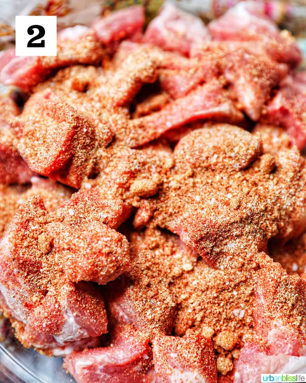 raw pork shoulder with seasoning.