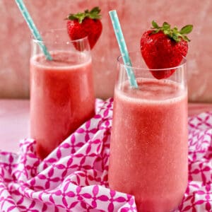 Strawberry watermelon smoothie in two glasses.