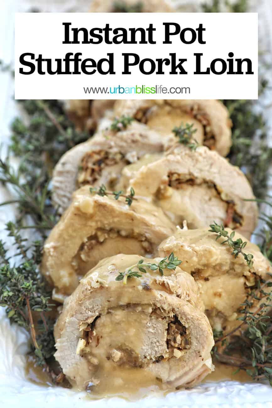 sliced stuffed pork loin on a white plate with a bed of herbs and title text overlay.