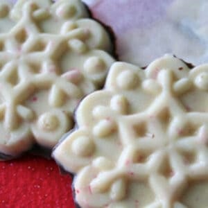 white chocolate peppermint bark shaped like a snowflake.