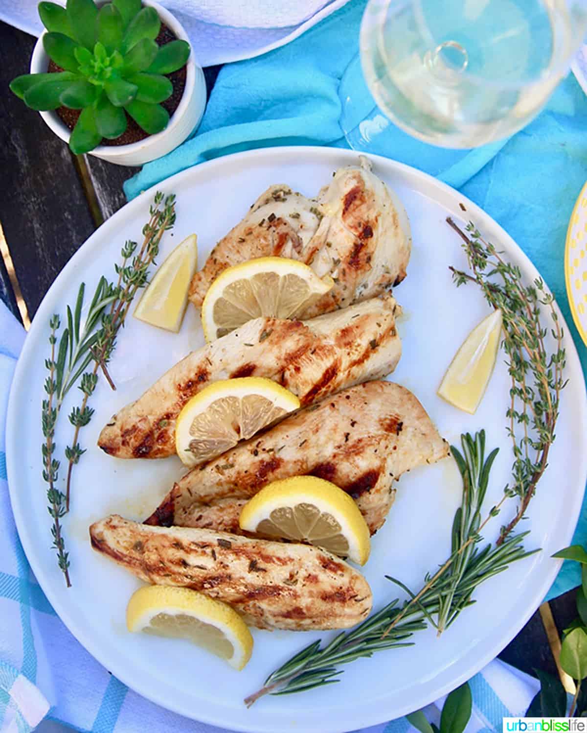 Grilled lemon pepper chicken with fresh rosemary.