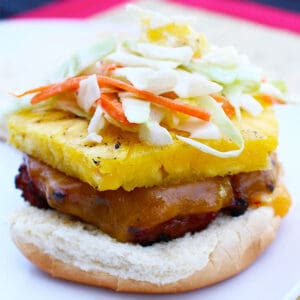 teriyaki turkey burger topped with pineapple slice.