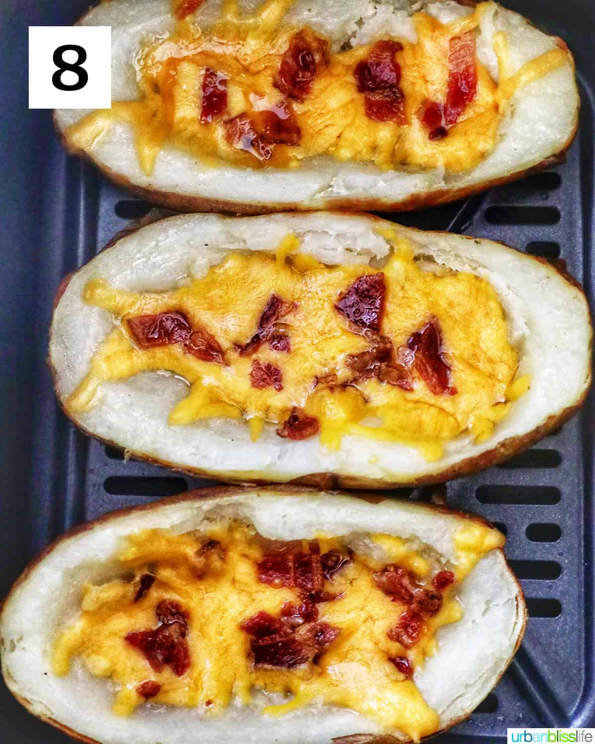 baked potato skins with bacon and melted cheese in an air fryer.