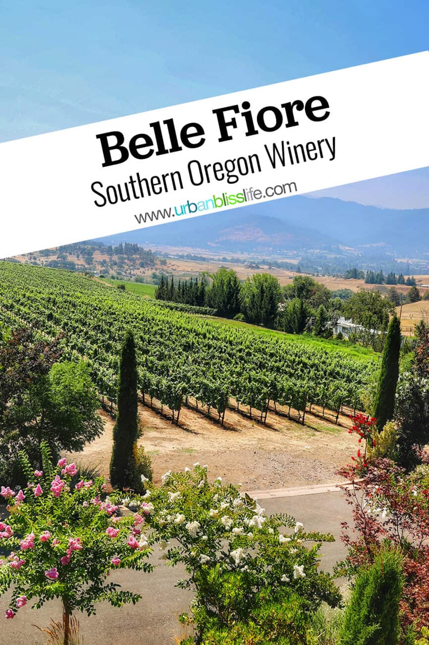 belle fiore vineyards with mountains and blue skies with title text overlay.