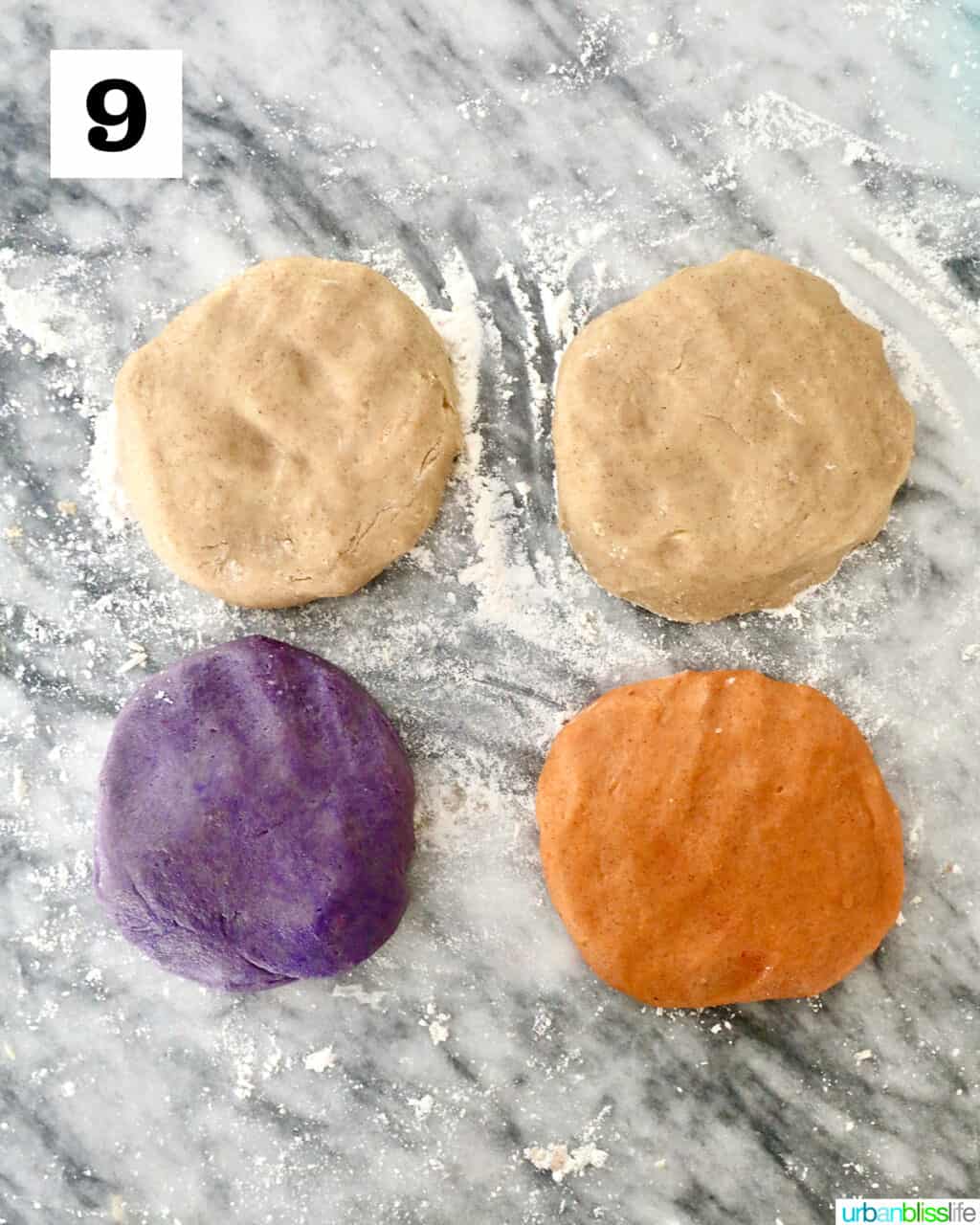 four dough discs for Halloween Pinwheel Cookies.