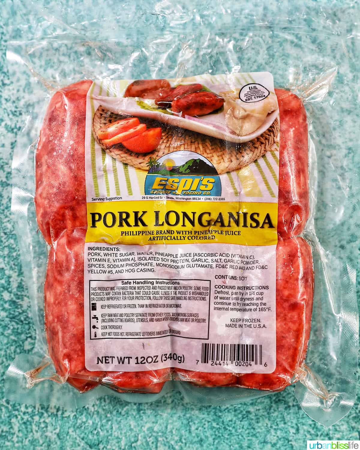 packaged Longanisa, Filipino pork sausage, on a blue table.