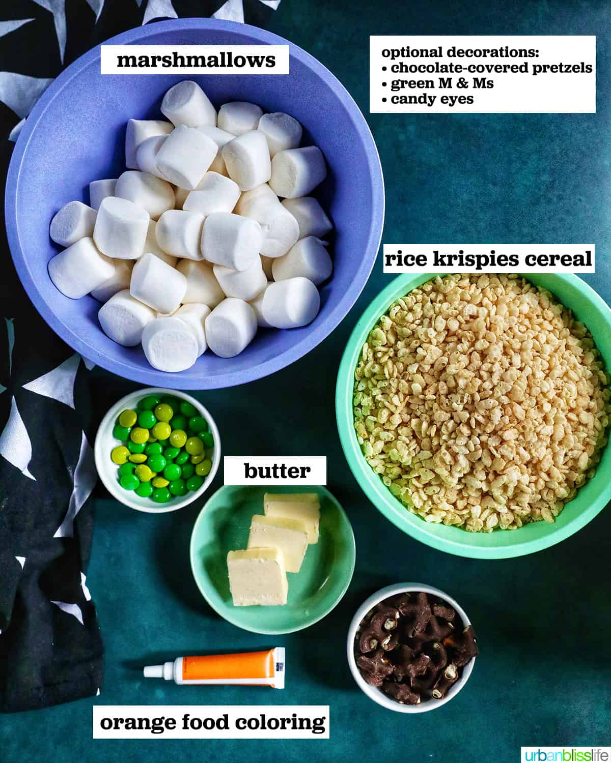 marshmallows, rice krispies cereal, and decorations to make pumpkin rice krispie treats.