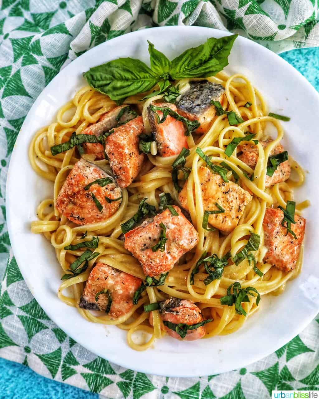 bowl of air fryer salmon bites with pasta.
