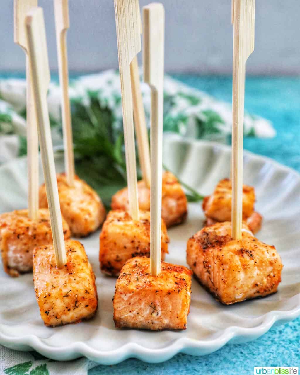 air fryer salmon bites served as appetizers on a plate.