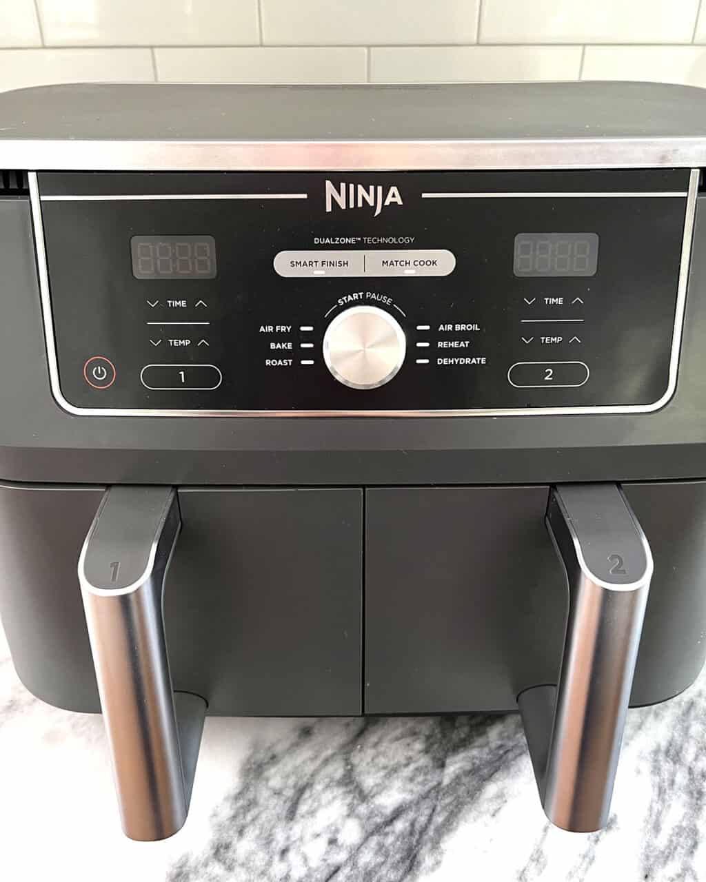 Ninja Foodi 10 Quart 6-in-1 DualZone XL 2-Basket Air Fryer with 2 Independent Frying Baskets.