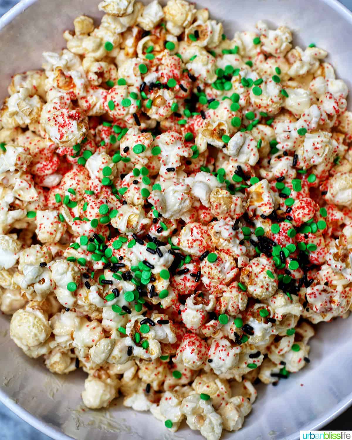 Christmas popcorn in a big white bowl.
