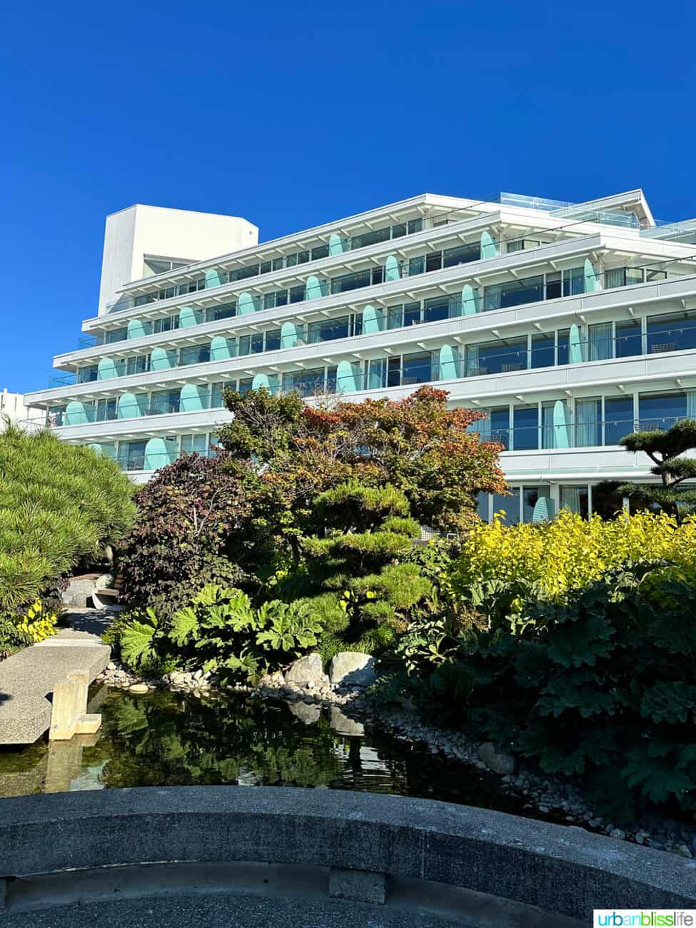 exterior of the harborview side of the Inn at Laurel Point hotel.