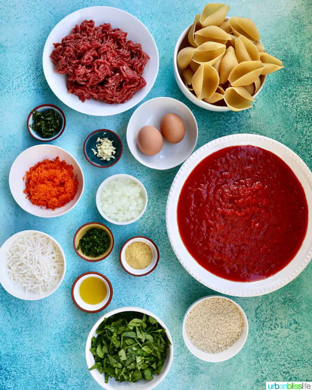 bowls of ingredients to make stuffed shells with ground beef.