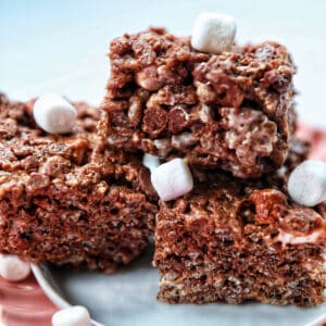 chocolate rice krispies treats stacked with marshmallows