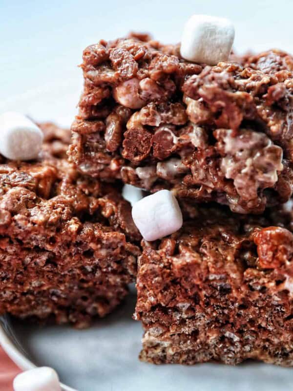 chocolate rice krispies treats stacked with marshmallows