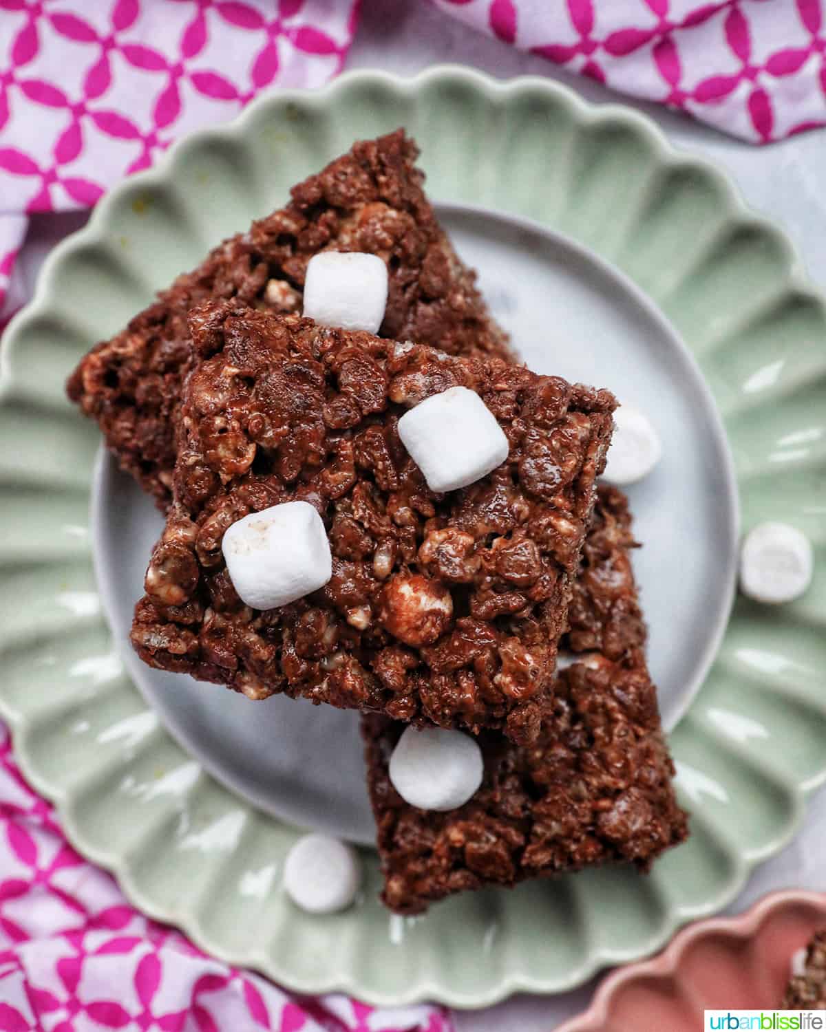 chocolate rice krispies treats stacked with marshmallows