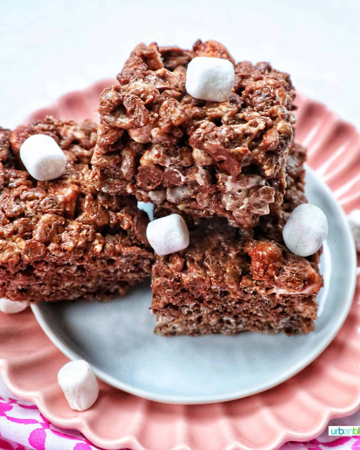 chocolate rice krispies treats stacked with marshmallows