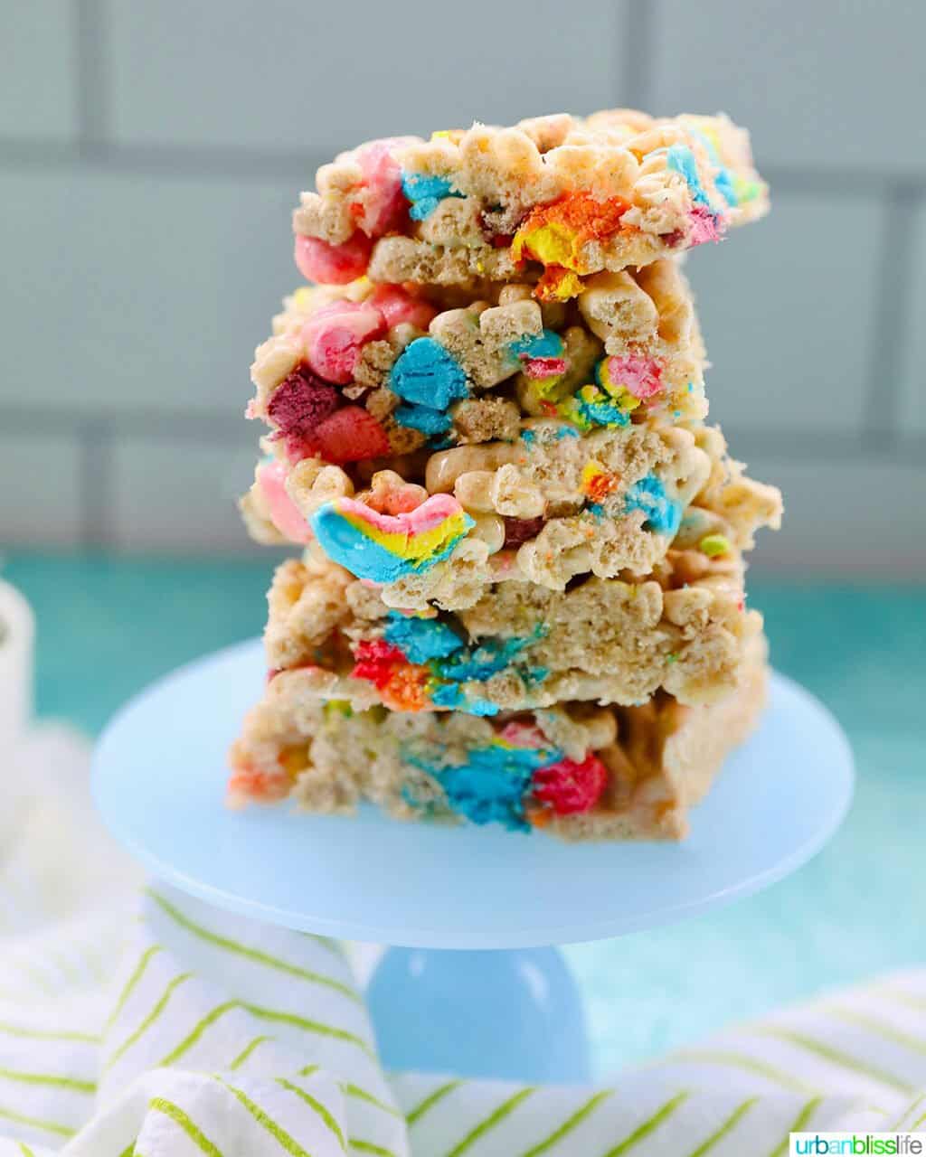 lucky charms cereal bars stacked on blue plate
