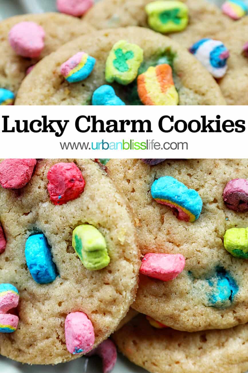 plate full of Lucky Charms Cookies on top of one another at angles with bright colorful marshmallows with text reading Lucky Charms Cookies.