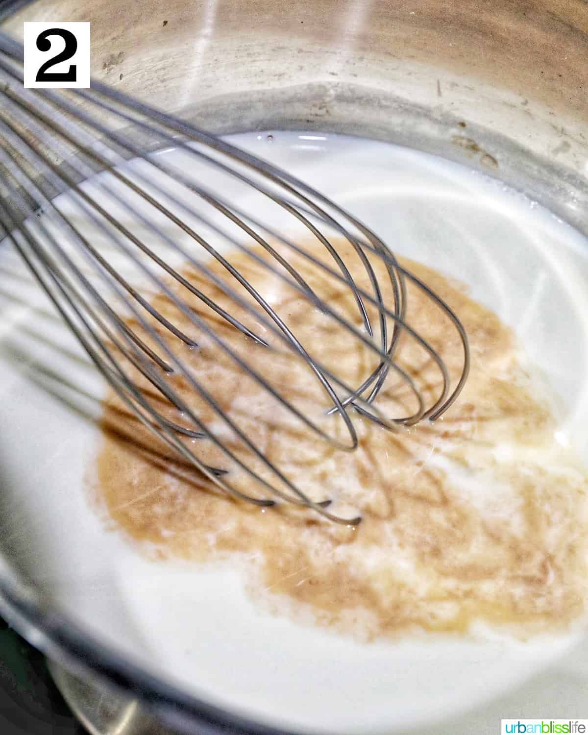whisking sugar, cream, and vanilla in a saucepan to make ice cream.