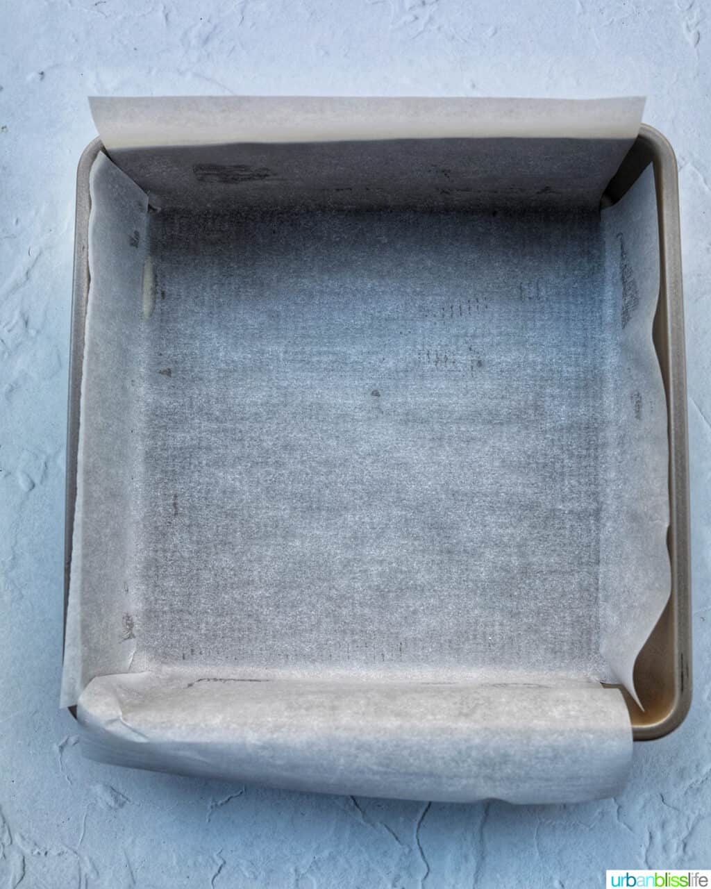 square baking pan lined with parchment paper.