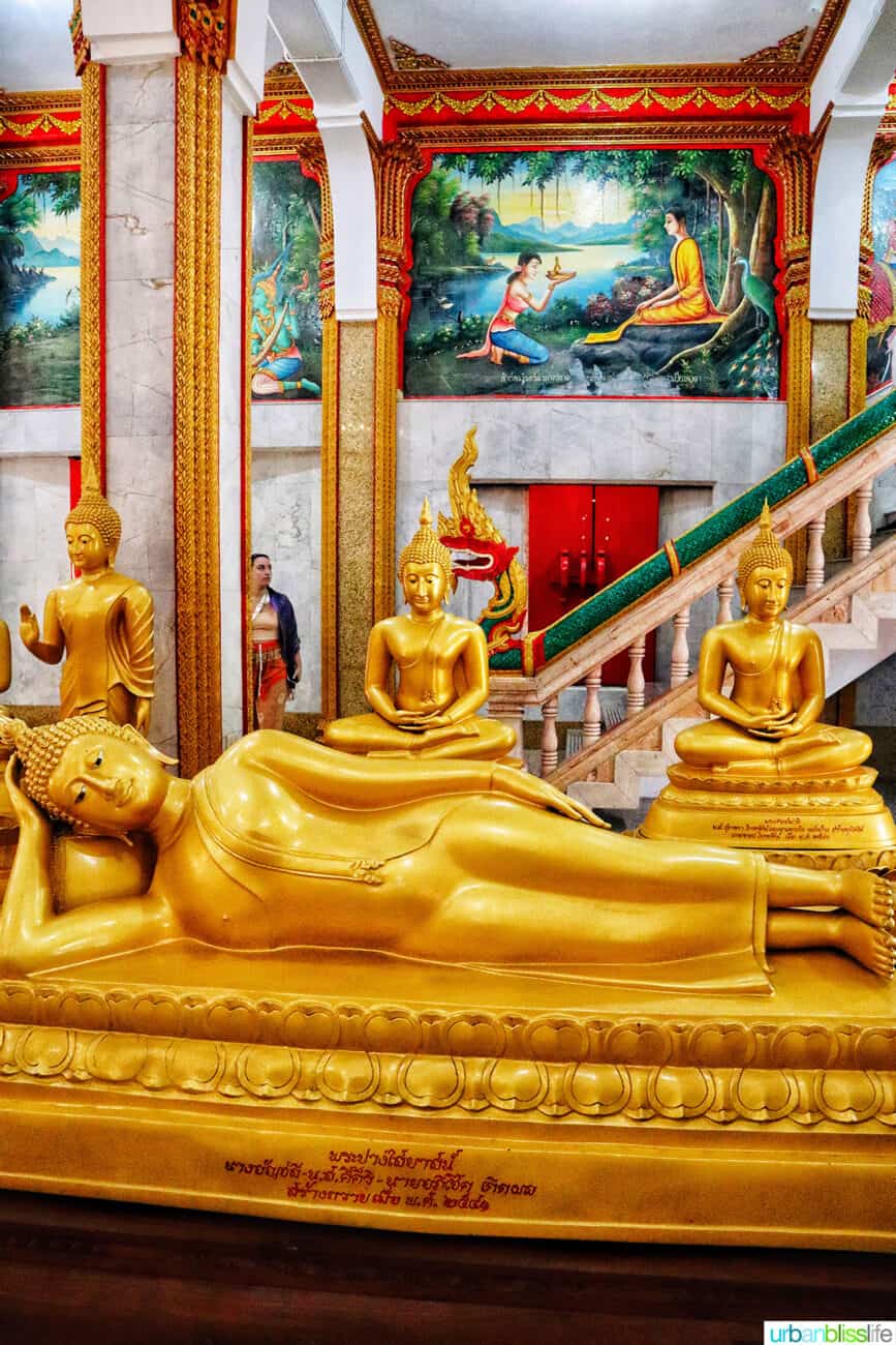 golden buddhas in the Prayer Hall of Wat Chalong Temple in Phuket Thailand.