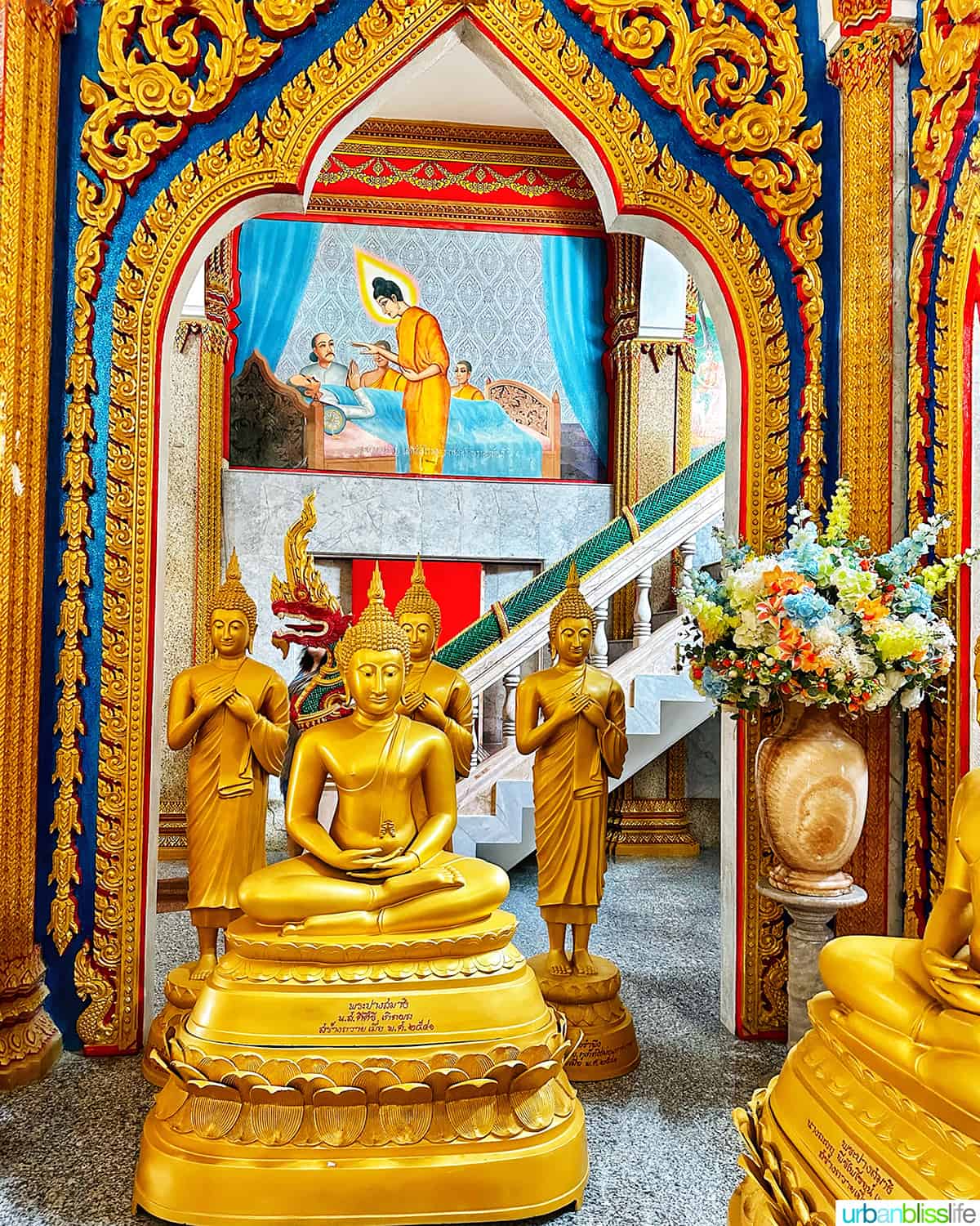 golden buddhas in the Prayer Hall of Wat Chalong Temple in Phuket Thailand.