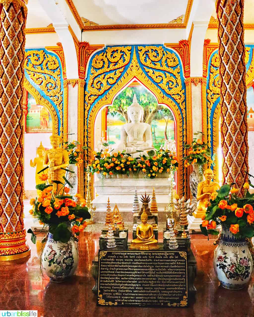 golden buddhas in the Prayer Hall of Wat Chalong Temple in Phuket Thailand.