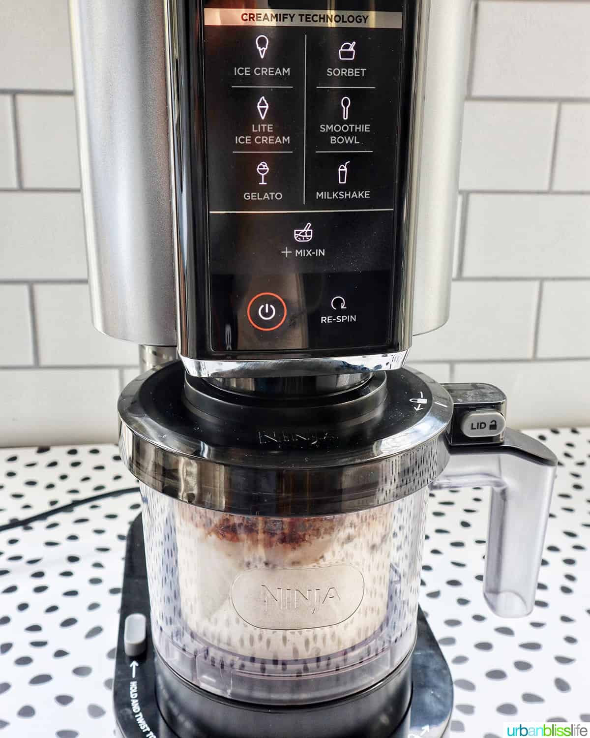 Ninja Creami ice cream machine making coffee milkshake.