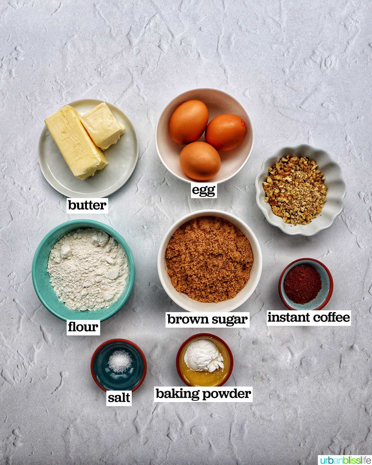 bowls of ingredients to make coffee walnut loaf cake.