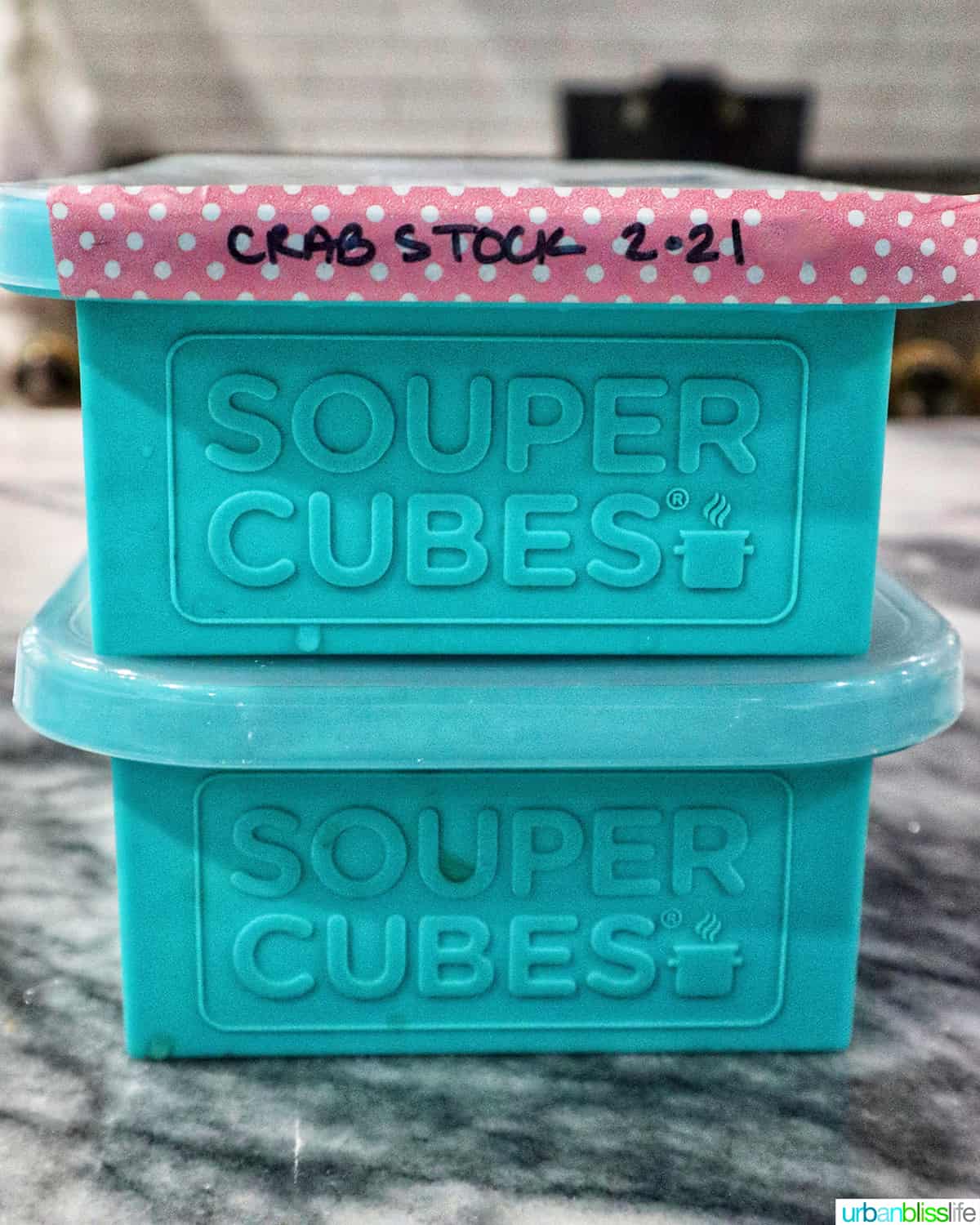 two souper cube containers labeled with crab stock.