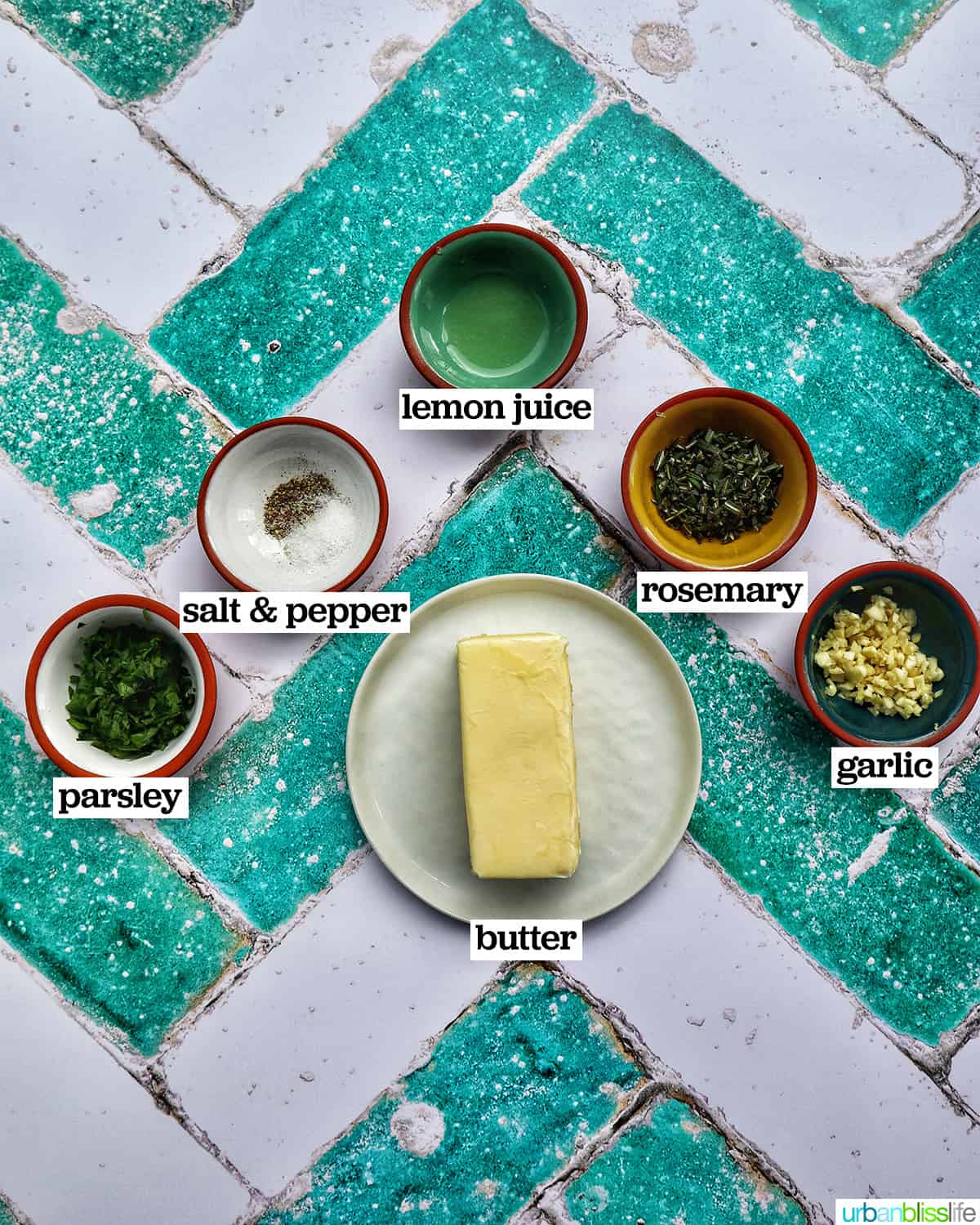 bowls of ingredients to make garlic herb compound butter.