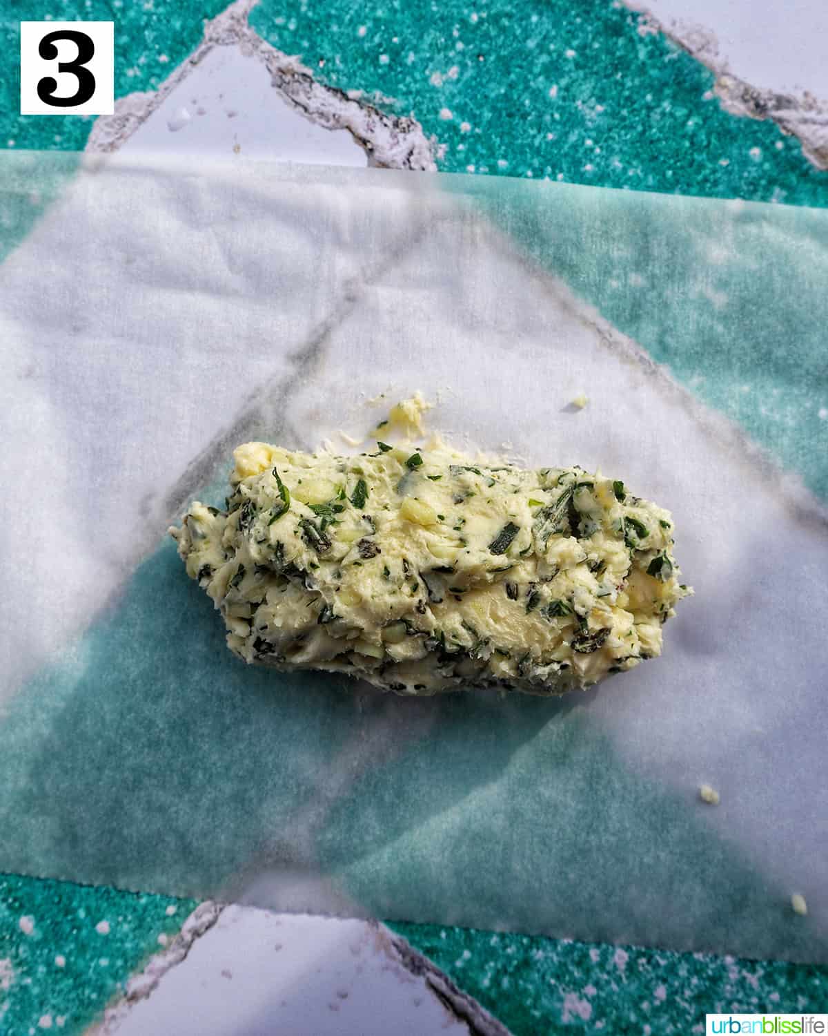 garlic herb compound butter on a parchment paper.