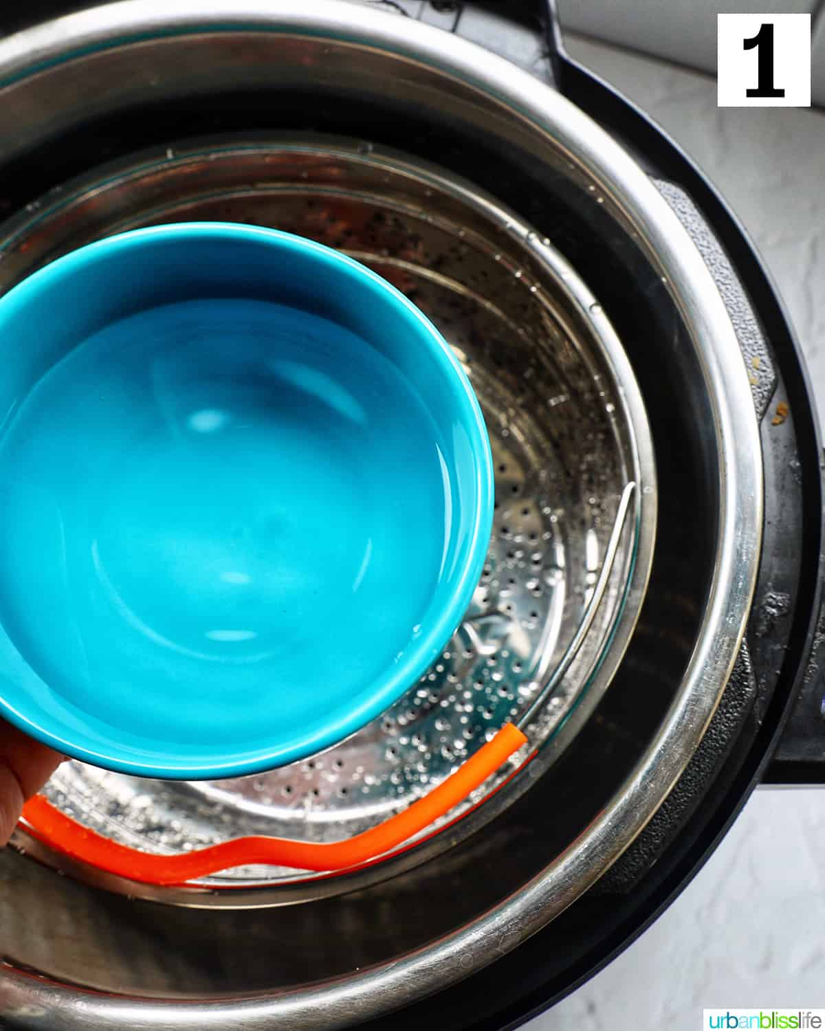 blow bowl with water over a steamer basket in an Instant Pot pressure cooker.