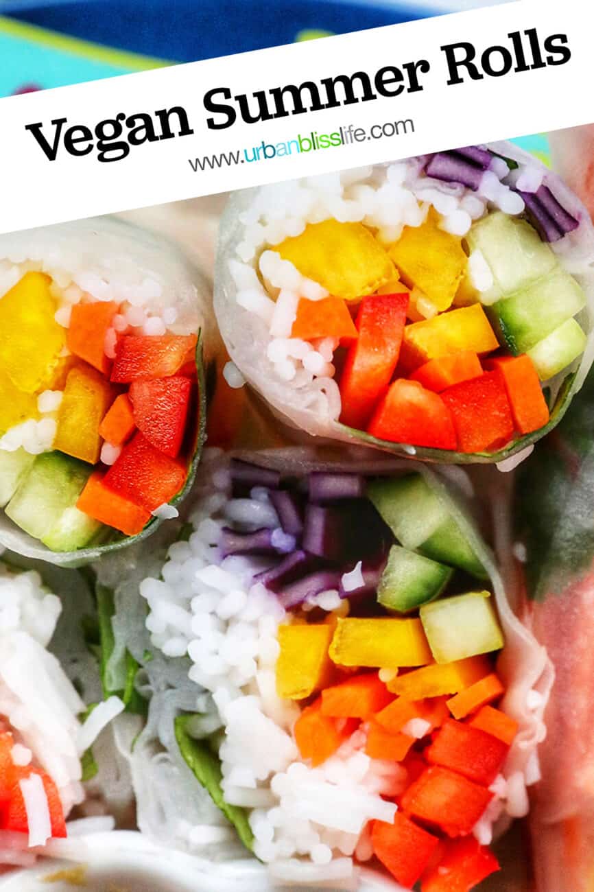 vegan summer rolls cut in half showing the vegetables and vermicelli noodles with text that reads Vegan Summer Rolls.