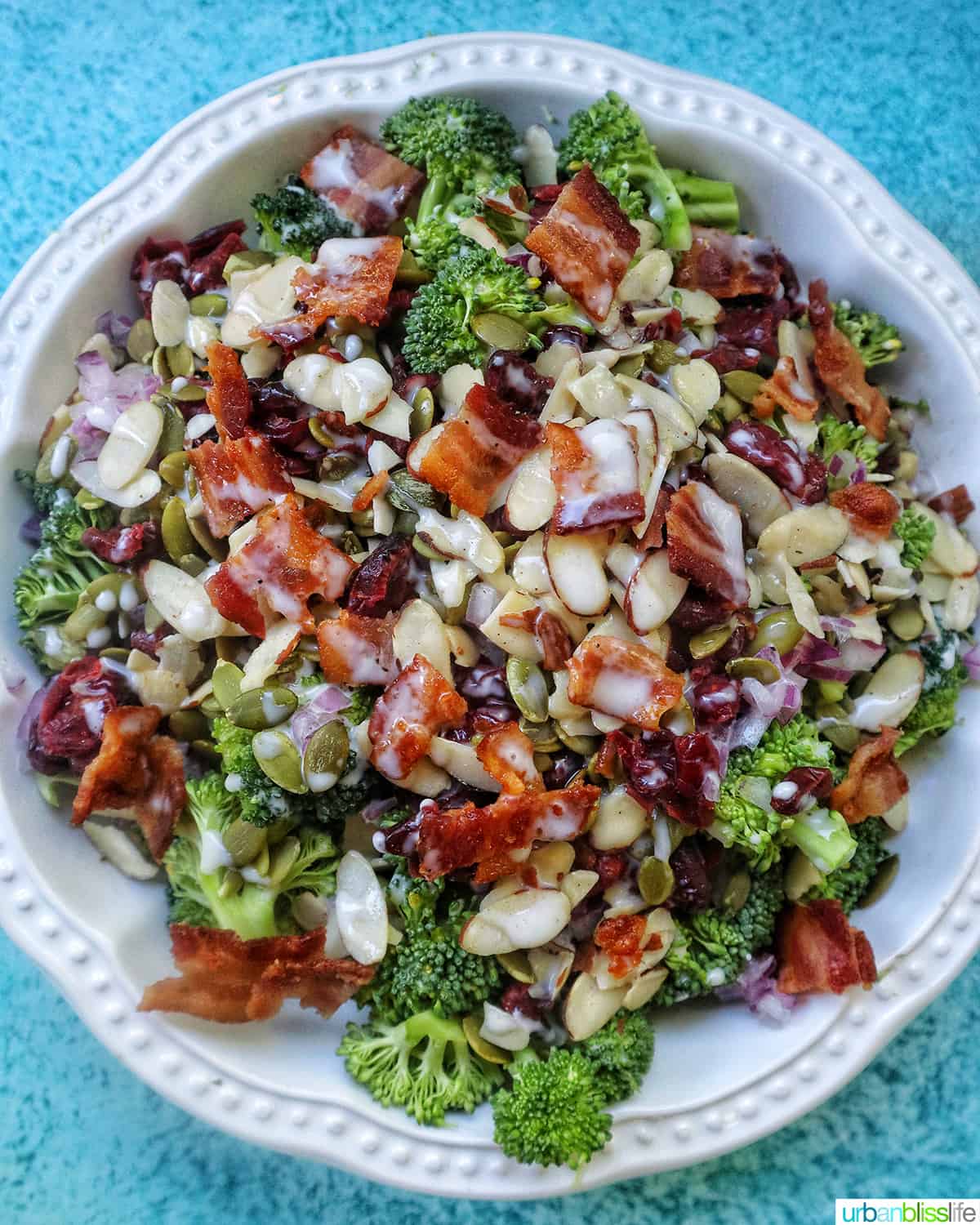 broccoli crunch salad in a white bowl.