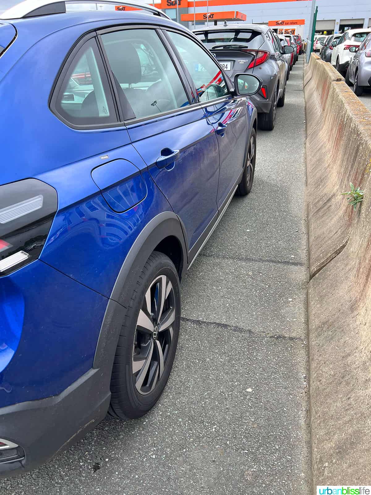 blue vw taigo with other cars at car rental in Ireland