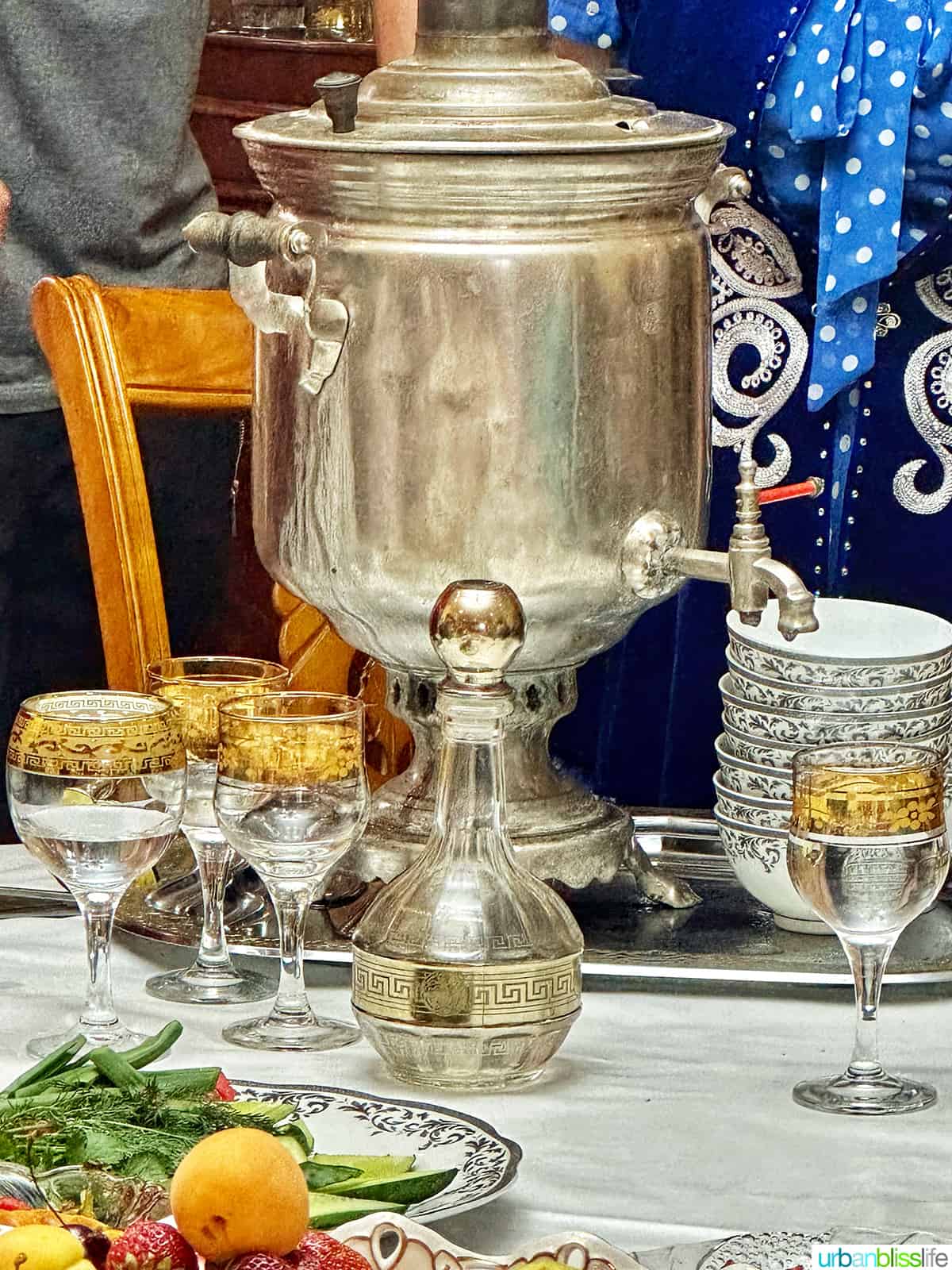 ancient tea pot with Kazakhstan tea and tea cups.