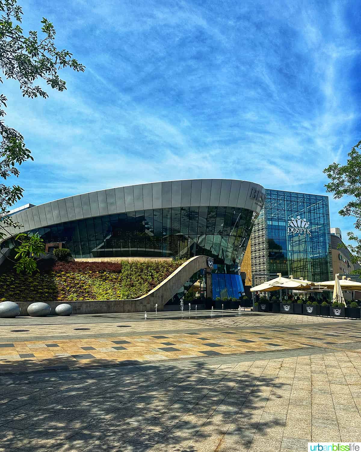 exterior of Dostyk Plaza, one of Almaty's premiere shopping malls.