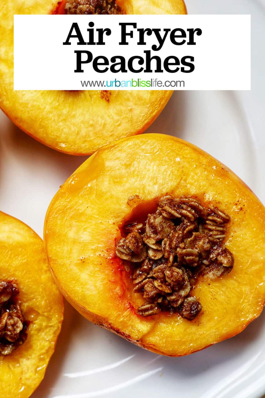 halved peaches with cinnamon oats topping on a white plate with title text that reads "Air Fryer Peaches."