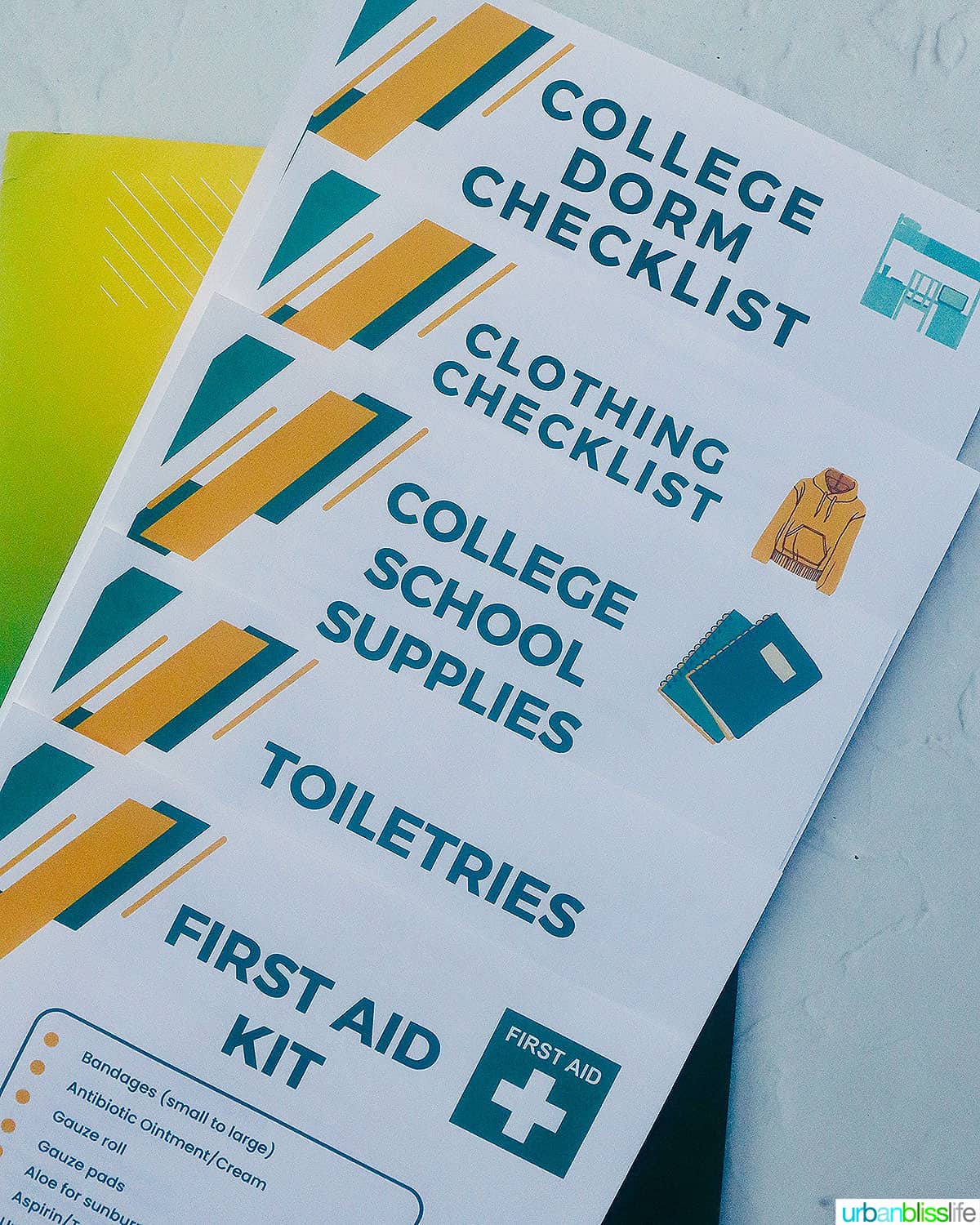 set of printable college move-in checklists stacked on top of one another.